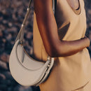 Bolsa Meia-Lua Feminina em Couro Sintético com Alça Ajustável